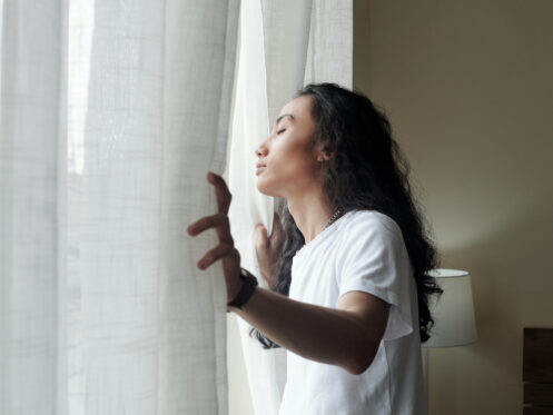 Homeowner opening window